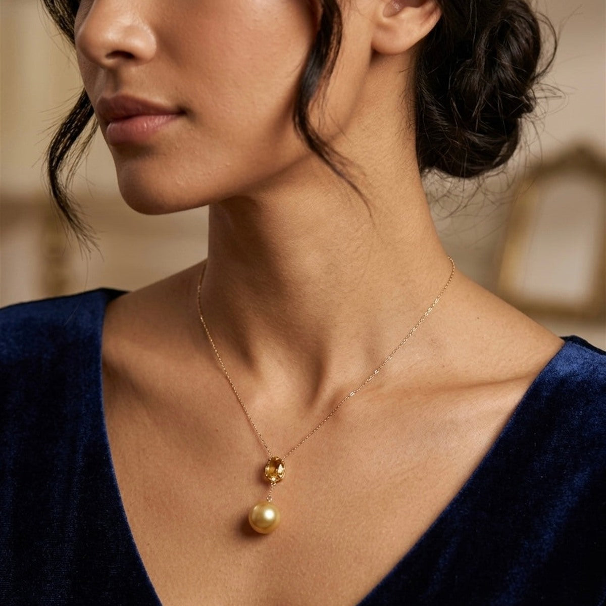 Golden South Sea pearl pendant worn on a fine gold chain