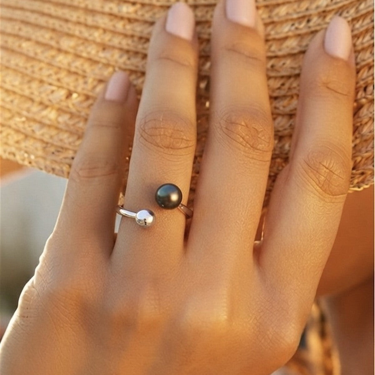 Tahitian pearl open ring worn on the hand