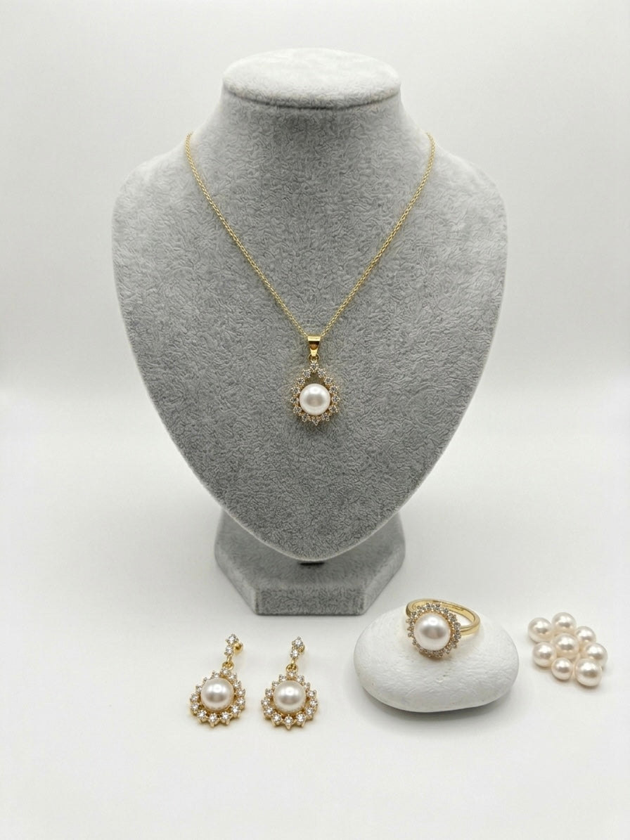Freshwater pearl halo set with necklace, earrings and ring on a display bust