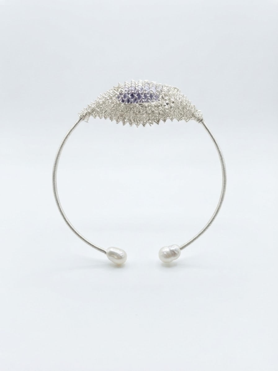 Silver sparkle freshwater pearl cuff with pearl ends on a white background