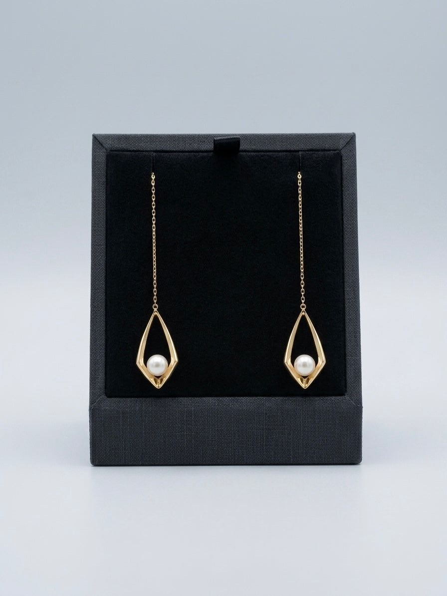 18k gold Akoya pearl drop earrings in a black gift box