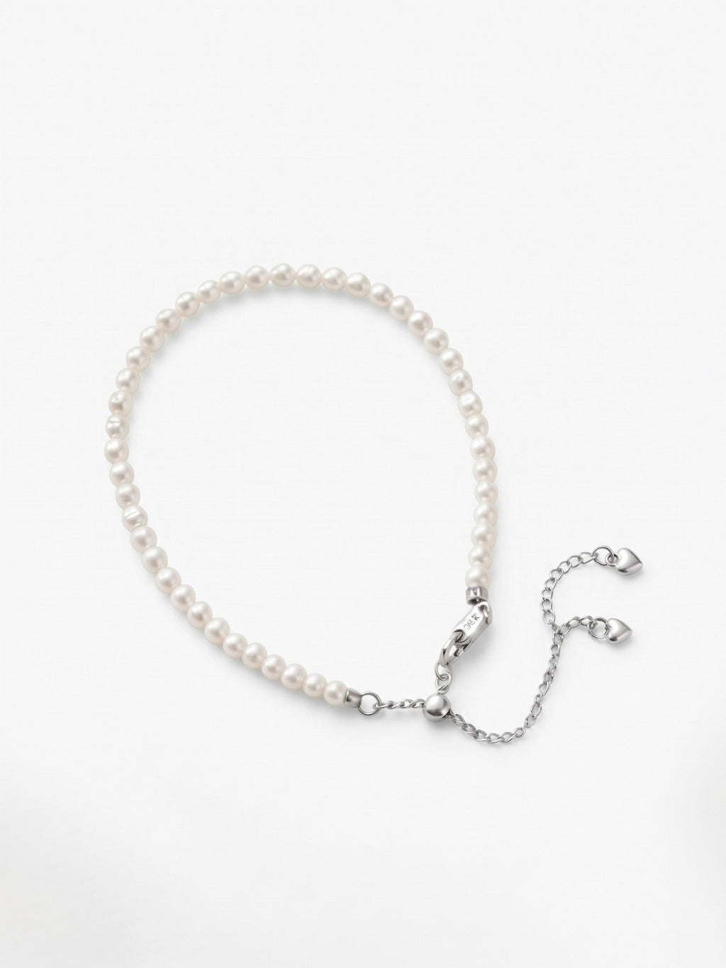 Freshwater baby pearl bracelet in 925 silver on a white background