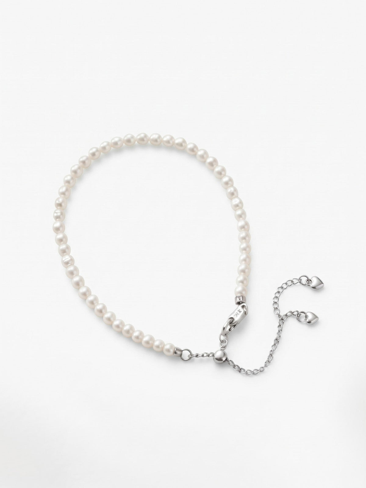 Freshwater baby pearl bracelet in 925 silver on a white background