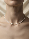 Freshwater baby pearl necklace from the 925 silver set worn at the collarbone
