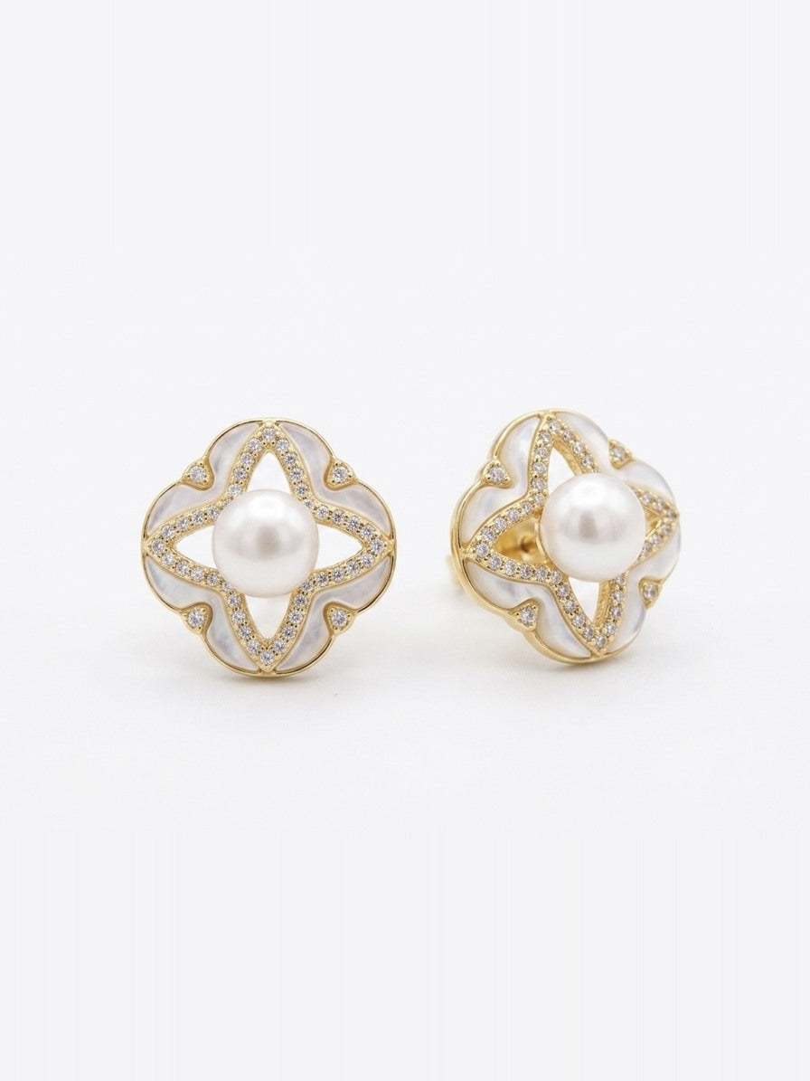 Gold-tone clover stud earrings with freshwater pearls and pearly white inlay