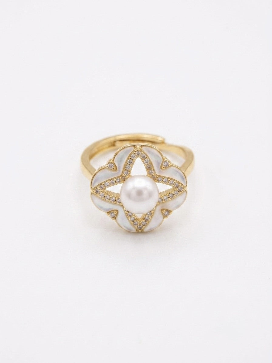 Gold-tone adjustable clover ring with freshwater pearl centre