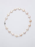 Freshwater coin pearl necklace with silver clasp on white background