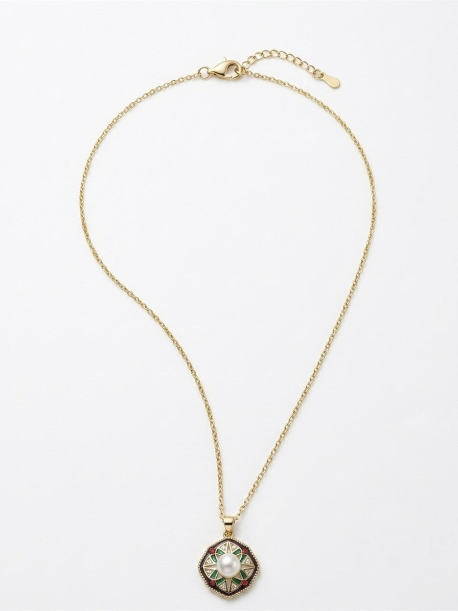 Vintage star enamel pendant necklace with a freshwater pearl on a gold-tone chain