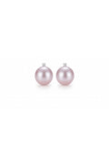 Large lavender pearl earrings topped with a sparkling stone, white background