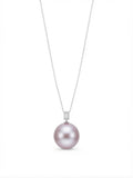Large lavender pearl pendant with baguette halo bail on white background