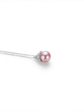 Lavender pearl cluster pendant necklace in 925 silver on a white background