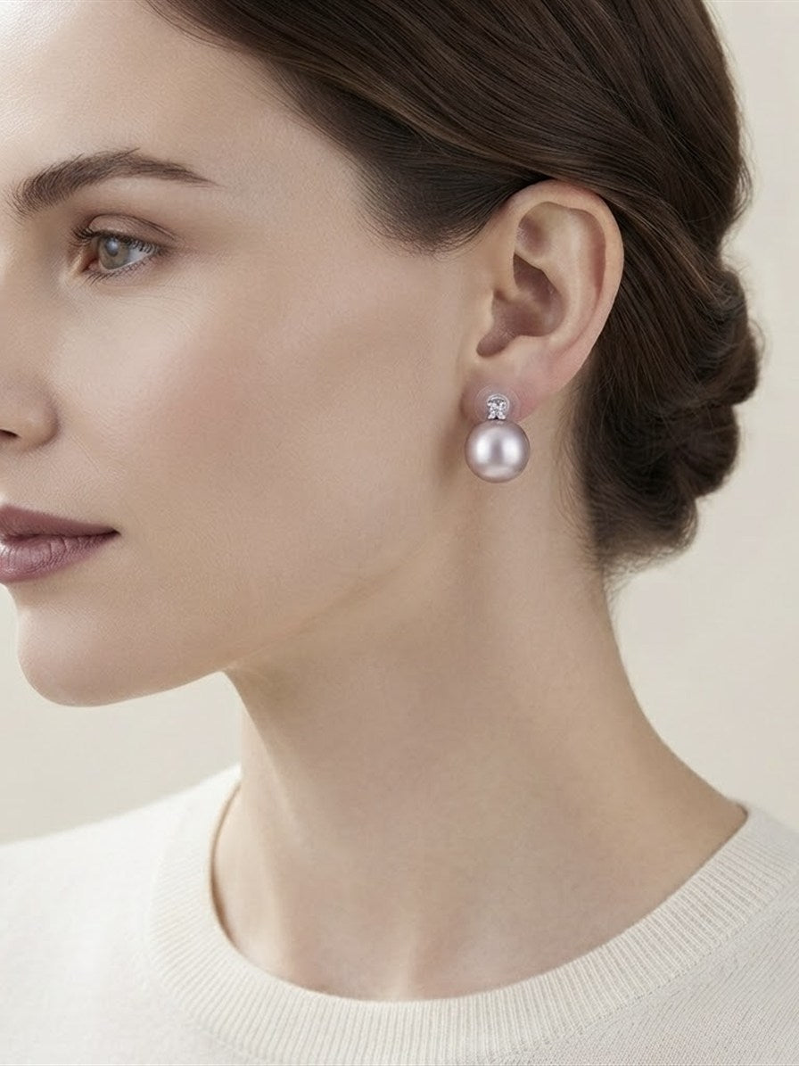 Large lavender pearl cluster earring worn on the ear