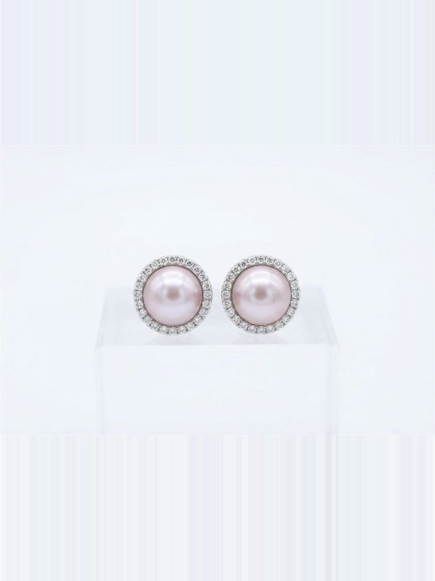Lavender pearl halo stud earrings in 925 silver on a white background