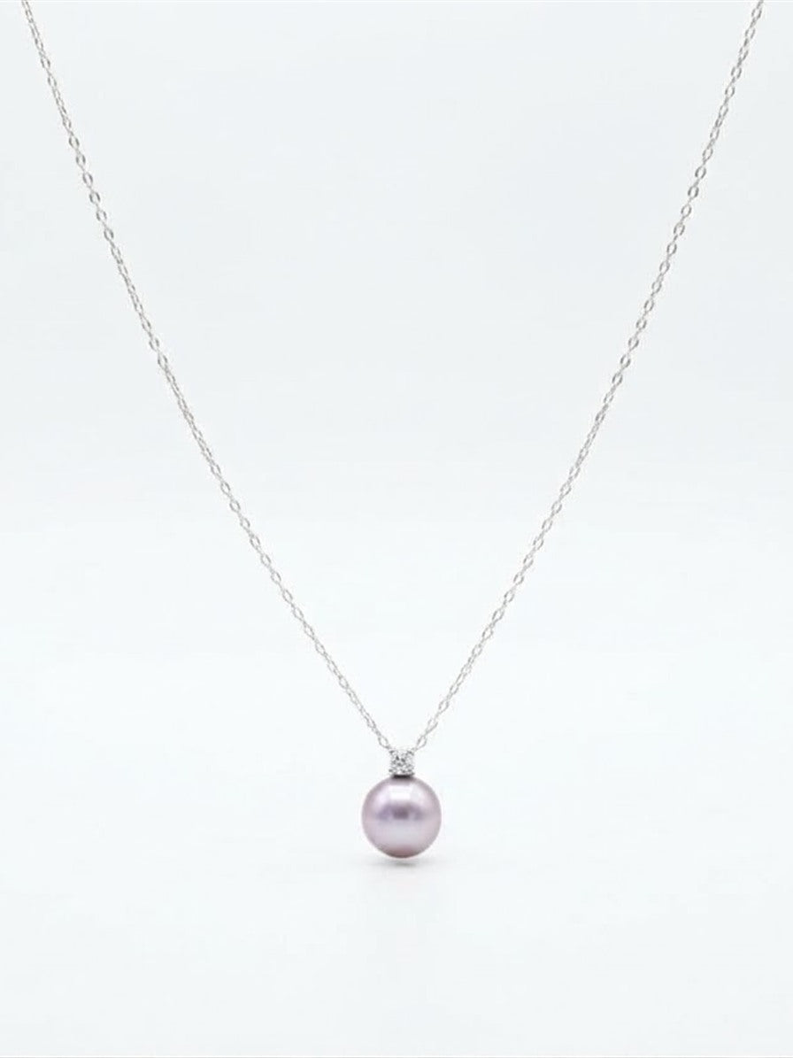 Lavender pearl pendant necklace from the solitaire set on a white background