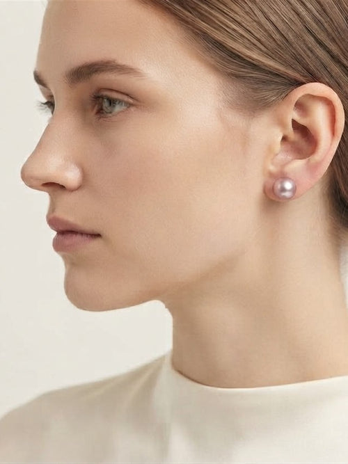 Model wearing a classic lavender pearl stud earring