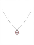 Large lavender pearl pendant with sparkling stone on a silver chain, white background
