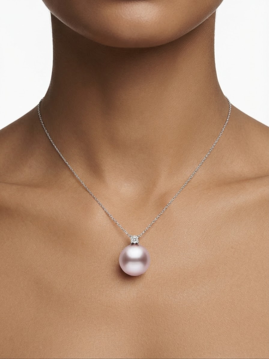 Large lavender pearl pendant worn on the neck