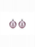 Lavender pearl solitaire stud earrings in 925 silver on a white background