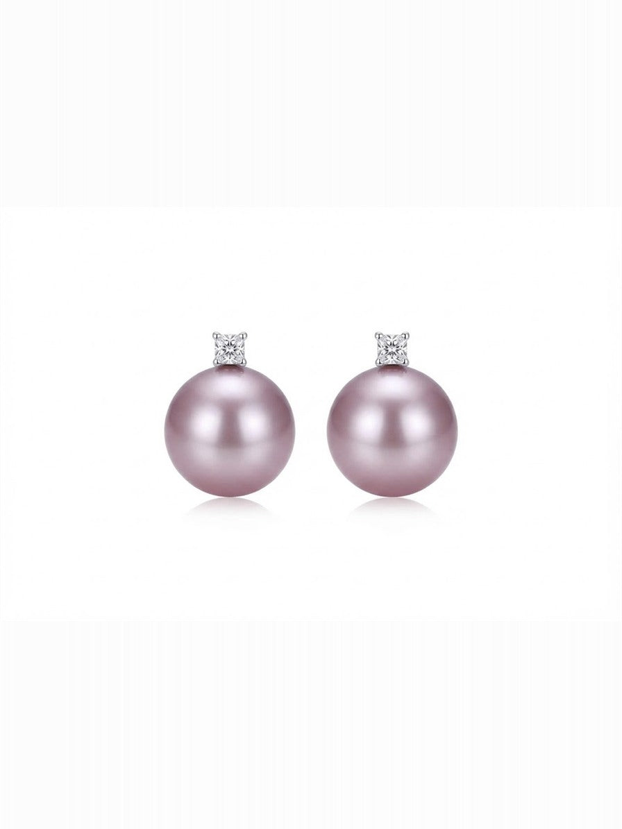 Lavender pearl solitaire stud earrings in 925 silver on a white background
