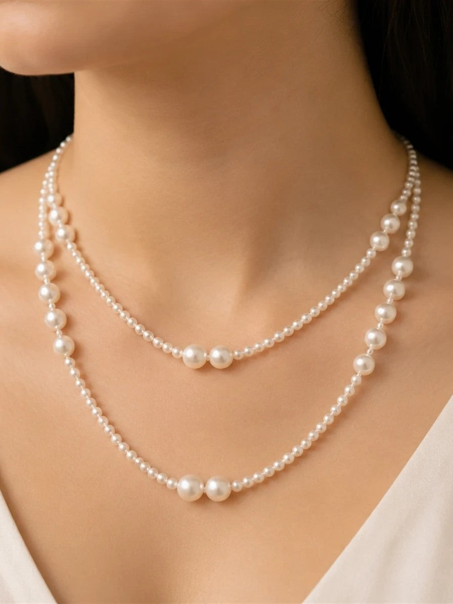 Long freshwater pearl necklace worn as two layers