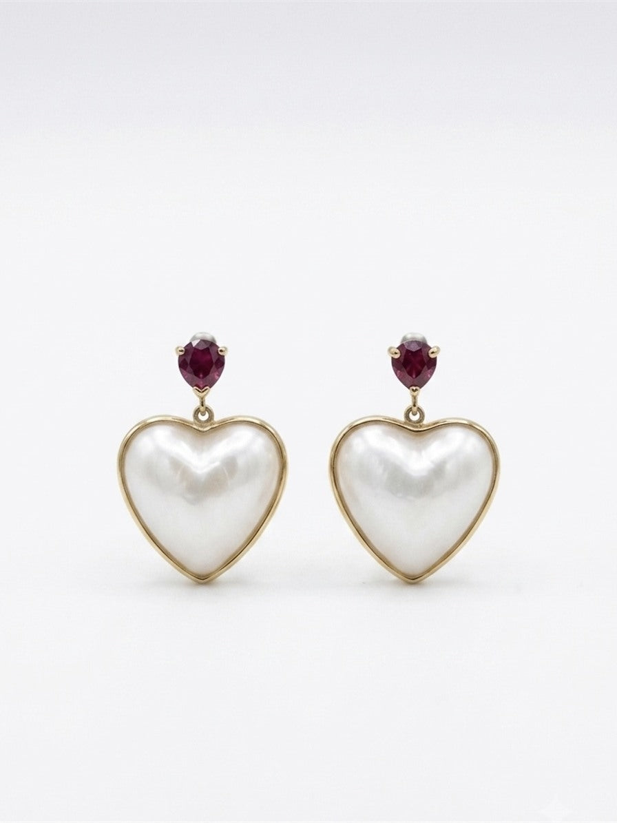 Heart-shaped mabe pearl earrings with Burma ruby studs in 18K gold
