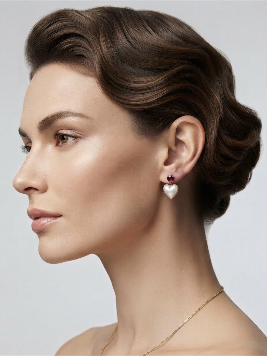 Mabe pearl heart and ruby earring worn on the ear