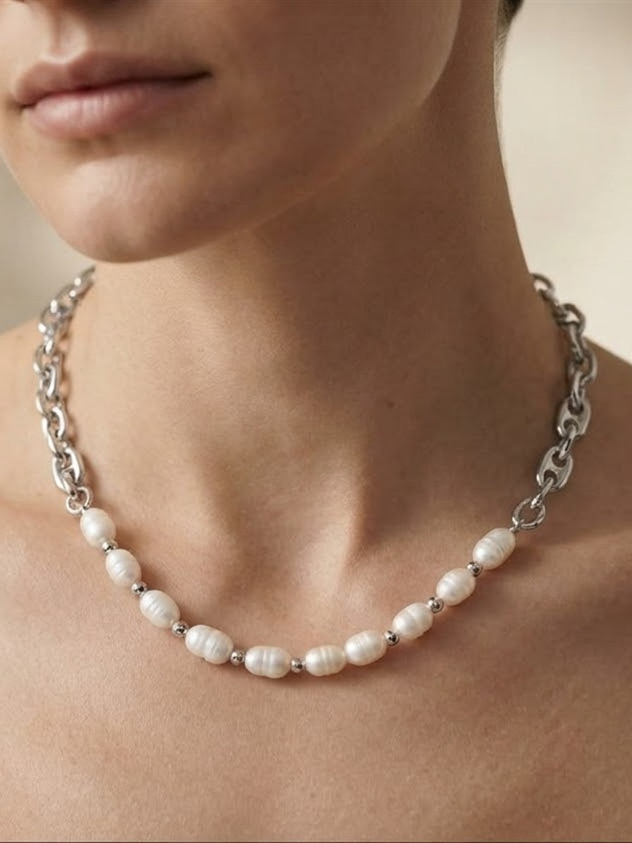 Freshwater pearl and mariner chain necklace worn on the neck
