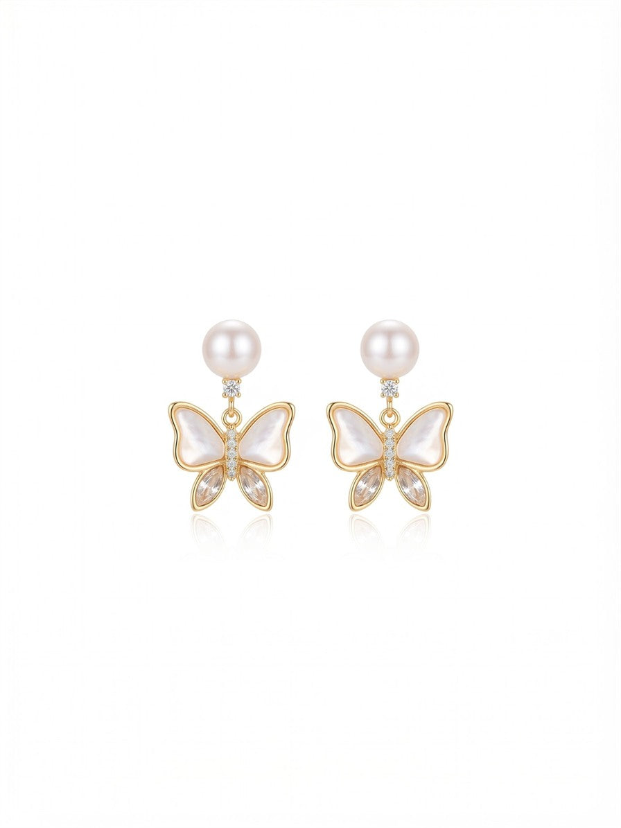 Freshwater pearl stud earrings with gold-tone butterfly drops