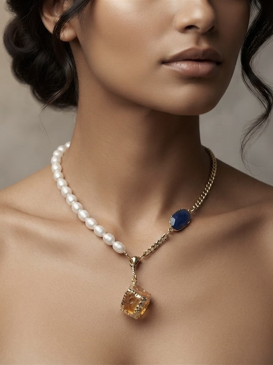 Freshwater pearl and amber raw stone statement necklace worn on the neck