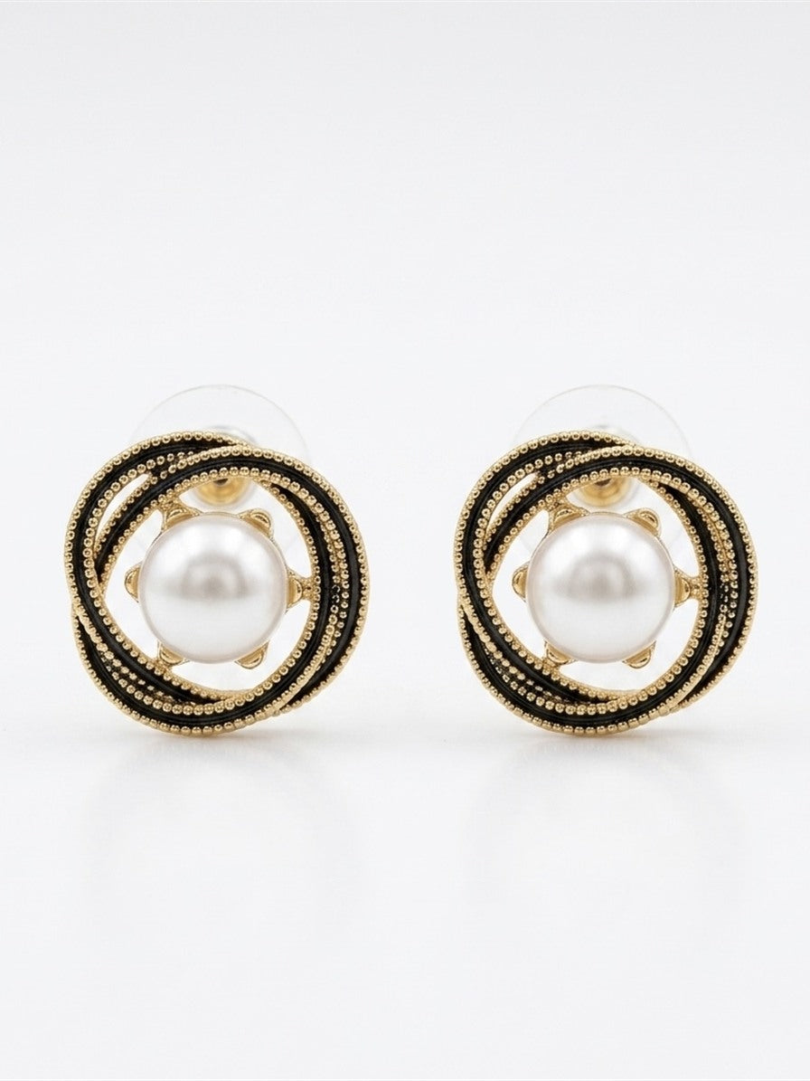 Love knot pearl stud earrings, close-up