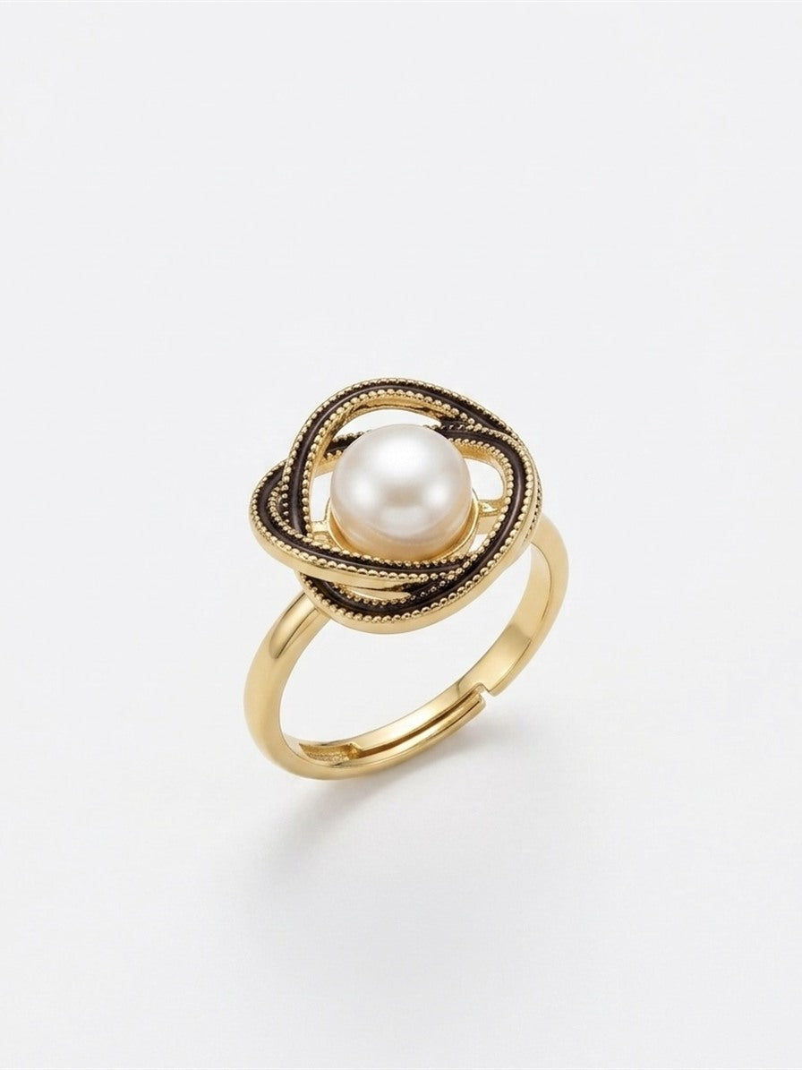 Love knot freshwater pearl ring with adjustable gold-tone band