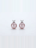 Pink pearl butterfly stud earrings in 925 silver on a white background