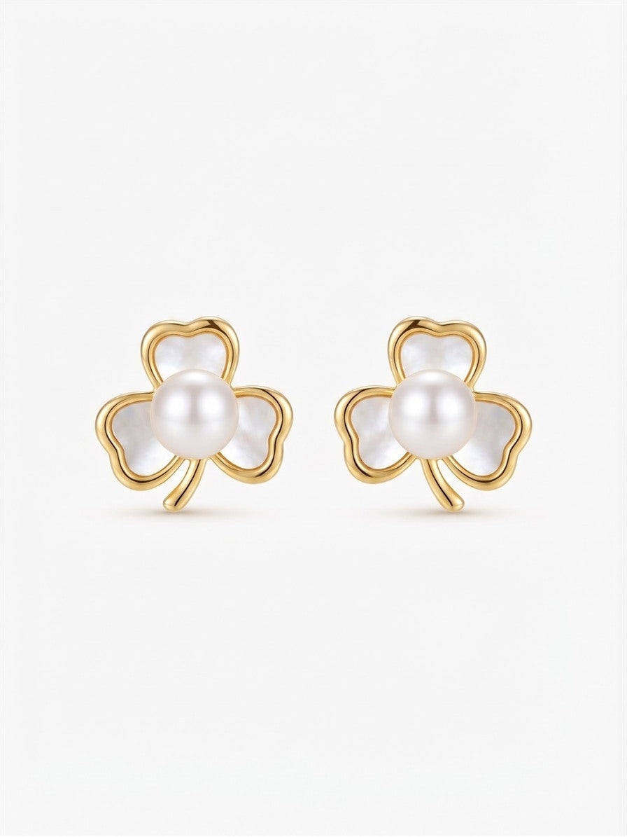 Gold-tone shamrock stud earrings with freshwater pearl centres