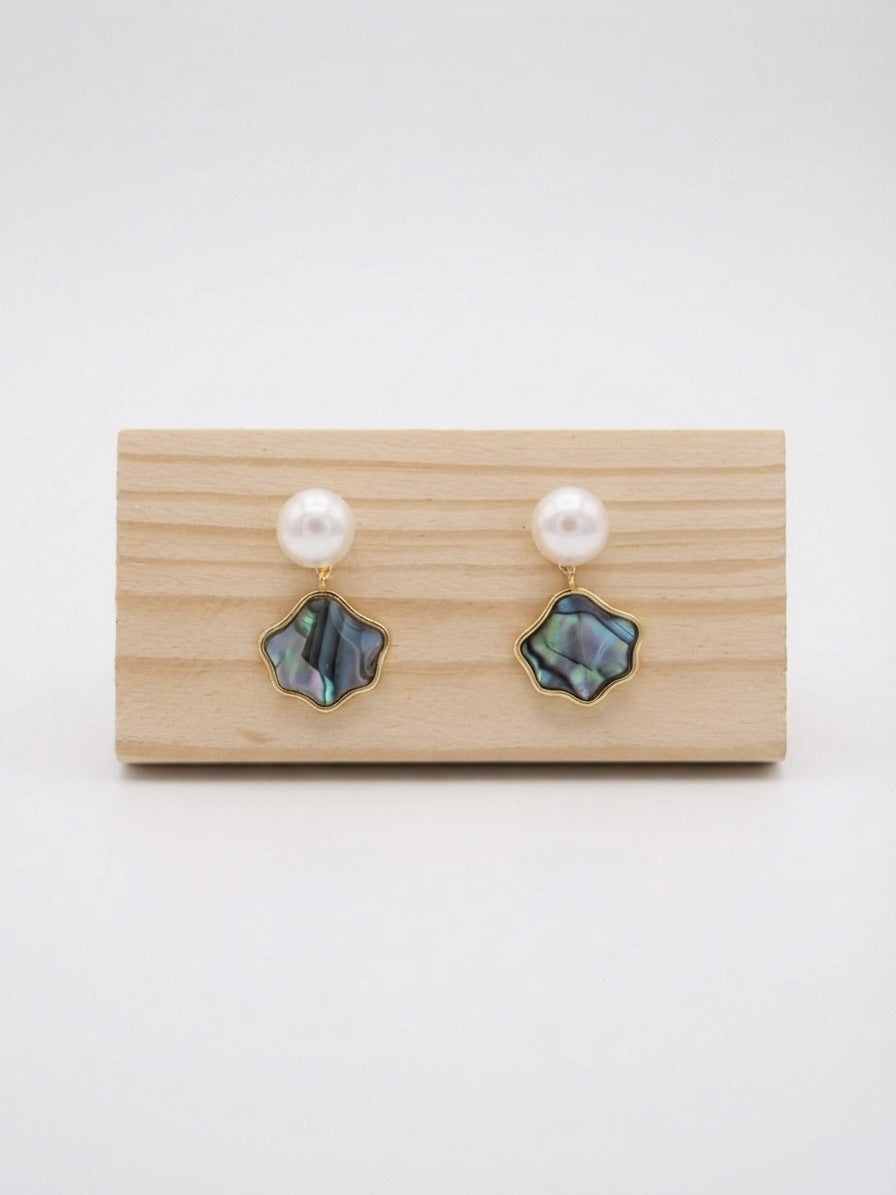 Freshwater pearl stud earrings with iridescent wave drops