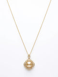 Golden South Sea pearl halo pendant on a gold-plated chain