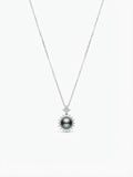 Tahitian pearl pendant with sparkling halo on a silver chain, white background