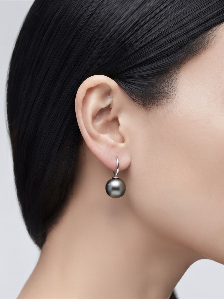 Tahitian pearl hoop earring worn on the ear