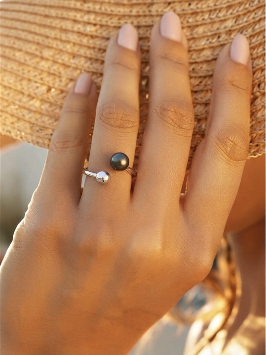 Tahitian pearl and silver ball open ring worn on the hand