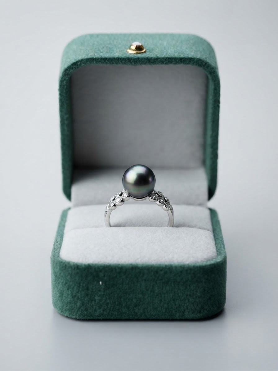 Tahitian pearl ring with sparkling lace band in a green velvet box