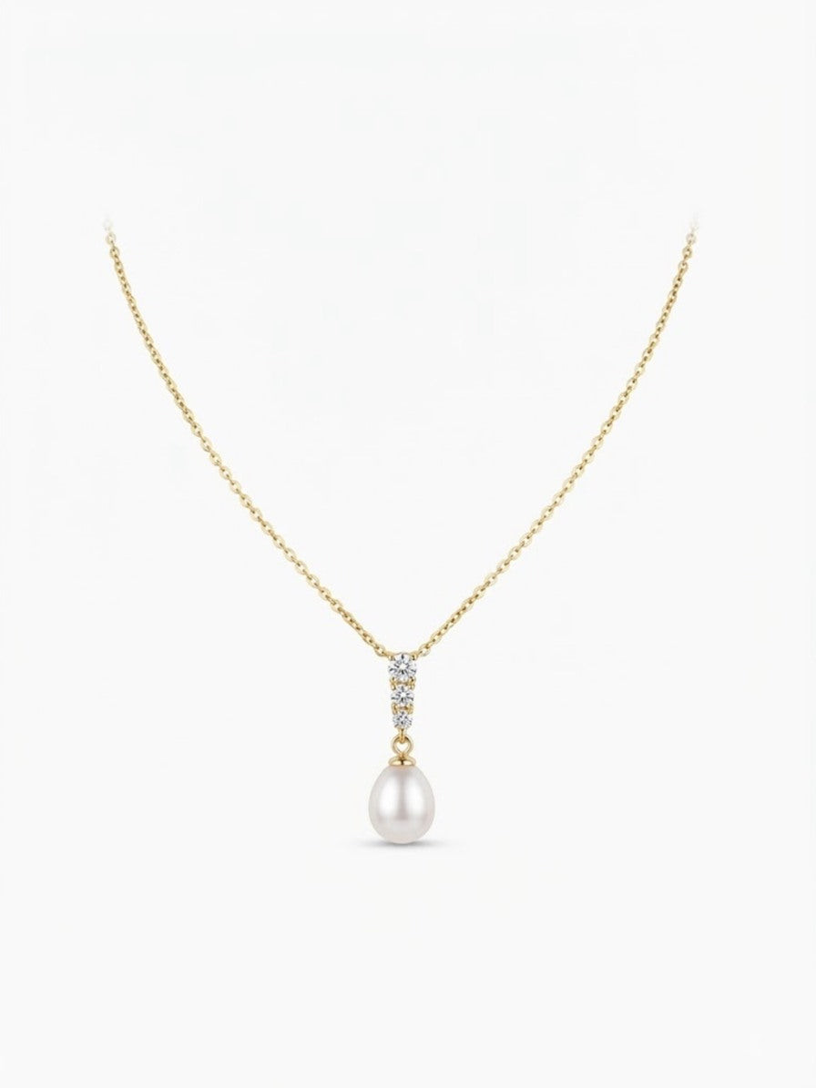 Gold-tone teardrop freshwater pearl pendant with three sparkling stones