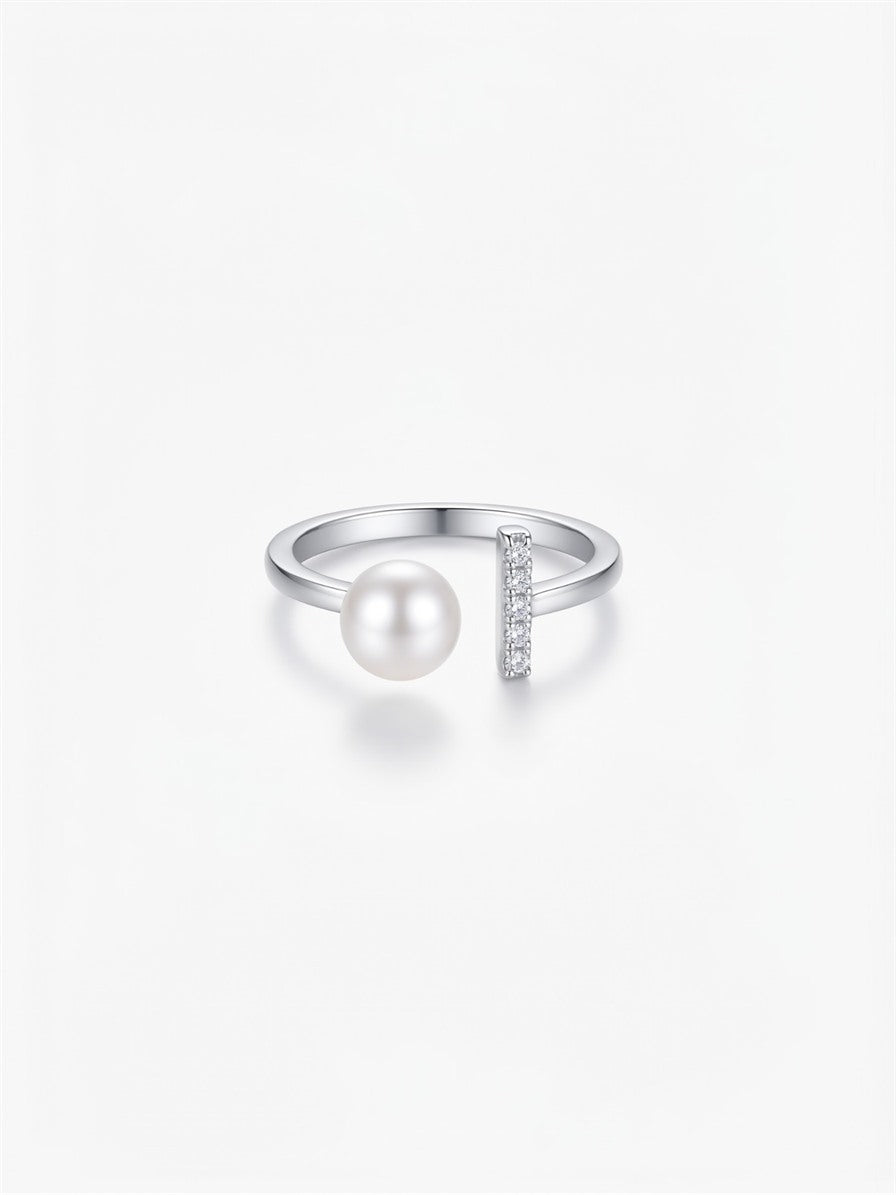 Silver-tone open ring with a round freshwater pearl and a bar of sparkling stones