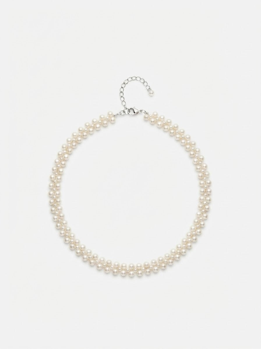 Woven freshwater pearl choker with 925 silver clasp on a white background